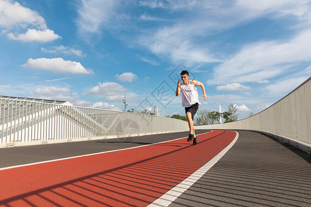 短跑运动青年男性户外跑步背景