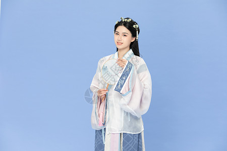 中国风古装汉服美女拿纸扇图片