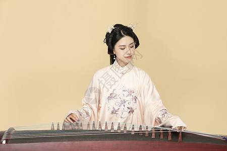 优雅的古琴古风汉服中国风美女弹古筝背景