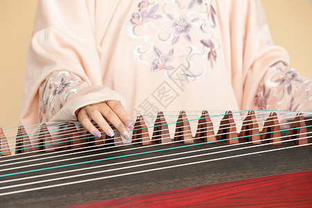 优雅的古琴古风汉服中国风美女弹古筝特写背景