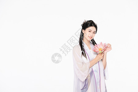  古风汉服美女捧花枝背景图片