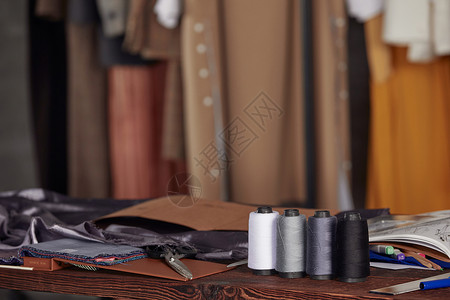 服装设计工作台特写手缝线高清图片素材