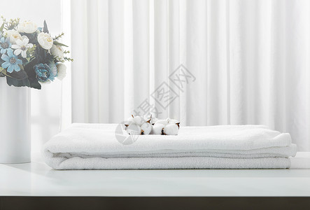 棉毛巾白色桌面上的棉花背景