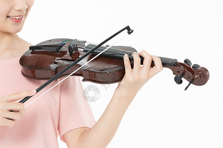 青少年女学生拉小提琴手部特写图片