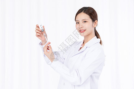 美女医护人员医生手持注射器打针背景