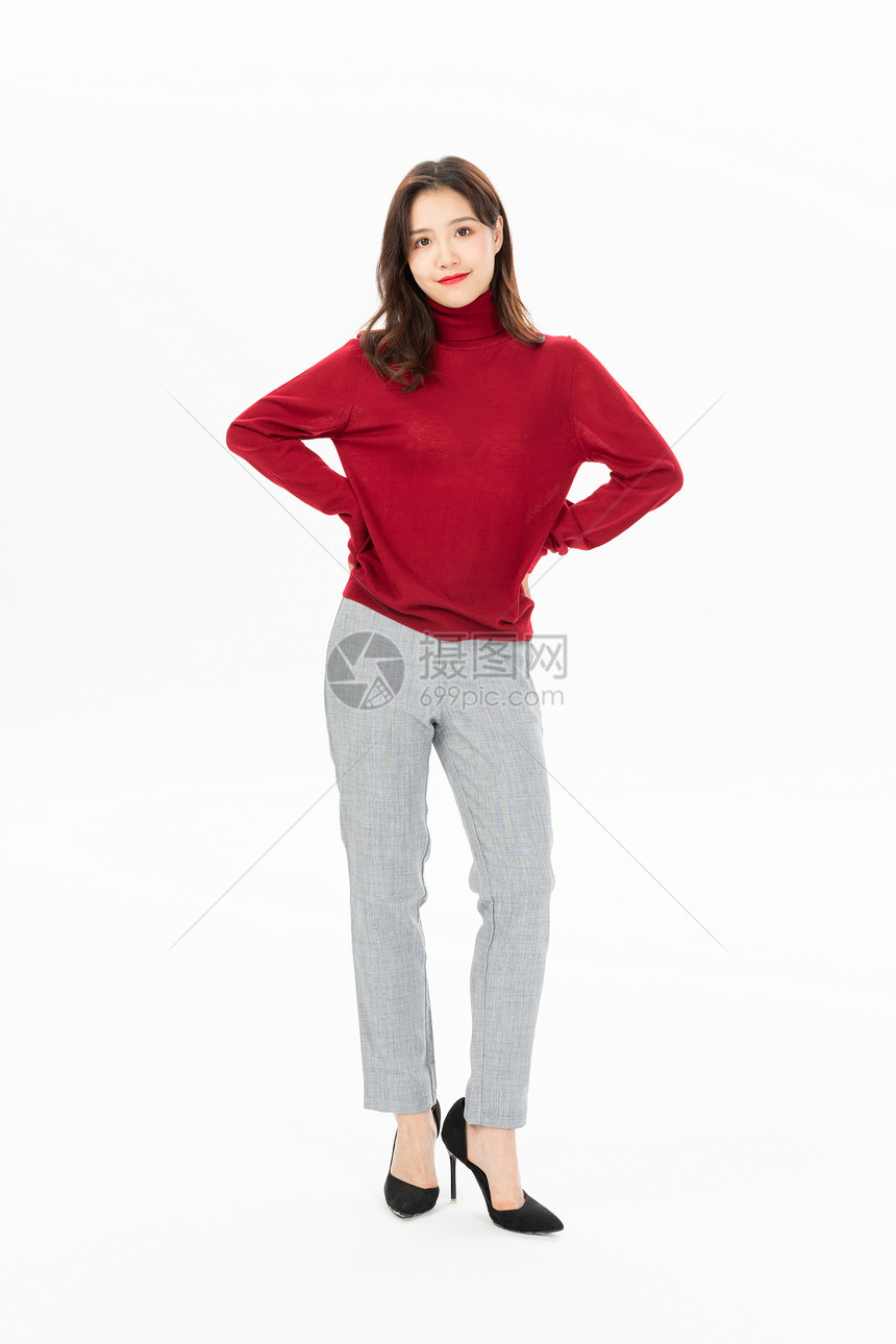 穿红色毛衣的时尚女性图片