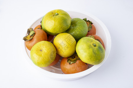 霜降苹果美食水果柿子和橘子背景