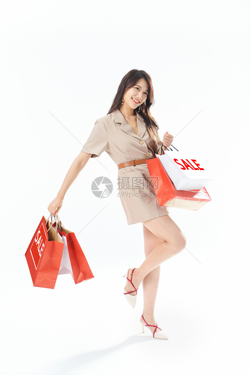 年轻美女消费购物概念图片