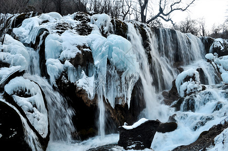 寒冷的冬季冰柱九寨沟冰川瀑布背景