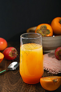 水果汁盘子柿子橙子汁背景