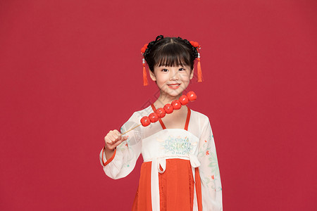 吃糖葫芦插画古风汉服中国风小女孩吃糖葫芦背景