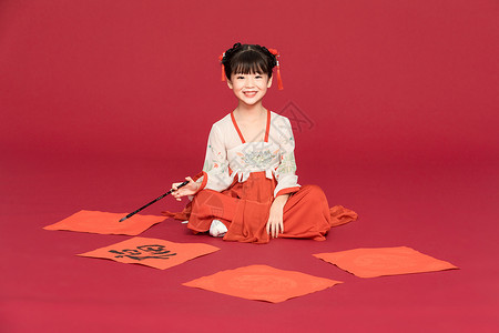 春节古装女孩古风汉服中国风小女孩写毛笔字背景