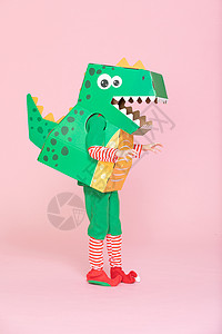 可爱小女孩cos装扮小恐龙背景图片