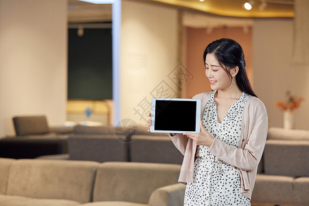 家居宣传三折页年轻美女手拿平板电脑展示背景