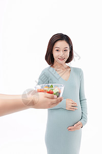 喜欢吃沙拉的孕妇高兴的人高清图片