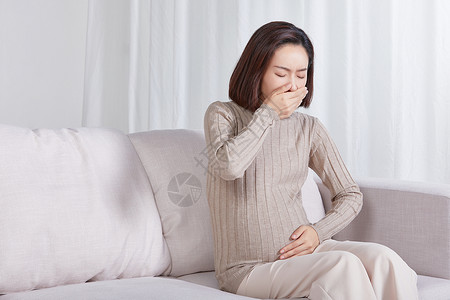 孕妇产前胎动 呕吐背景图片