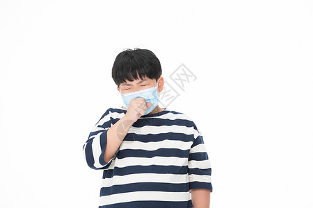 生病的小男孩戴口罩咳嗽的小胖子高清图片