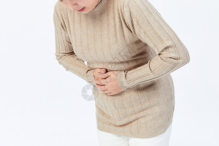 中年女性胃痛特写高清图片