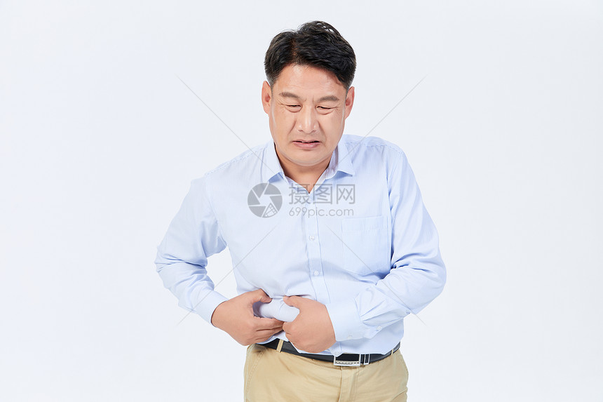 肠胃不舒服的中年人图片