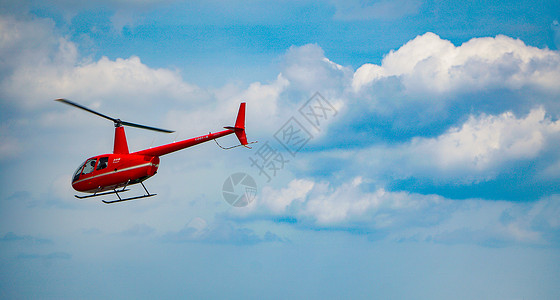 海南三亚凤凰岛直升飞机2飞行高清图片素材