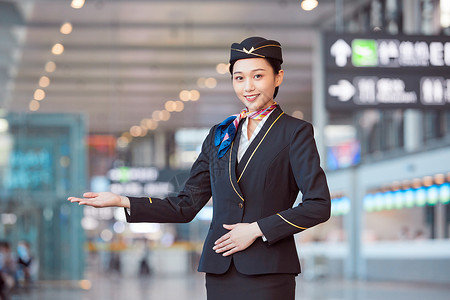 妖娆空姐装制服空姐空乘服务引导手势背景