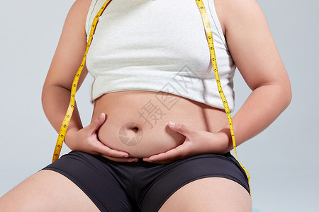 青少年肥胖摸肚子的小胖子运动减肥背景