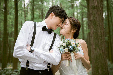 亚洲新娘幸福情侣甜美婚纱照背景