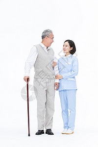 护士搀扶老人散步行动不便的人背景图片