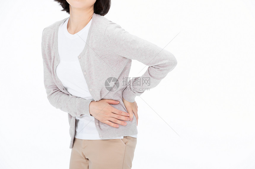 女性腰部疼痛特写图片