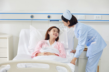 婴儿医院素材月子中心医护人员照顾产妇背景