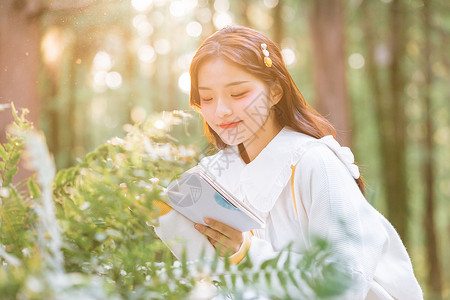 森系美女公园阅读学习高清图片