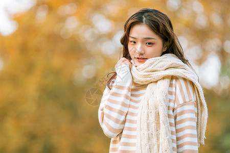 秋季围围巾元气美女背景图片