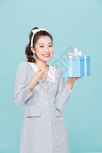 韩系装扮青春少女指礼物盒图片