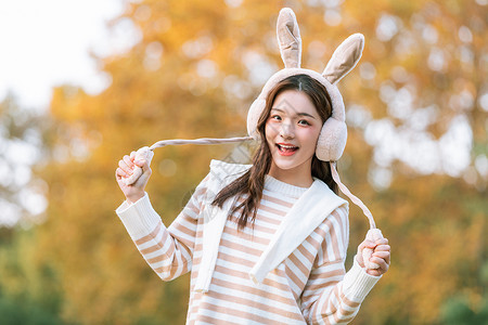 兔年份可爱头戴兔耳朵秋季甜美女孩背景