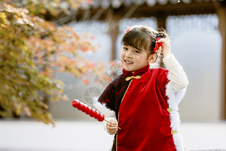喜庆新年人像中国风儿童新年逛公园吃糖葫芦背景