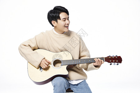 吉他课素材韩系阳光男生弹吉他形象背景