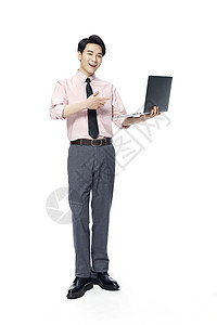 年轻商务男士手捧笔记本电脑图片