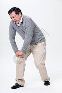 膝关节炎老人膝盖疼痛表情痛苦背景