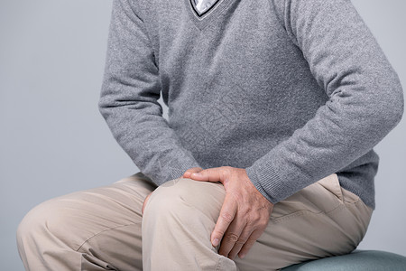 膝关节炎老年膝盖疼痛特写背景