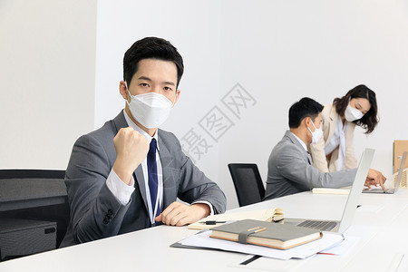 企业复工佩戴口罩宣传海报疫情期间商务人士戴口罩抗疫办公背景