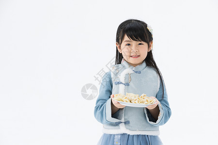 夹棉马甲捧着饺子的小女孩背景