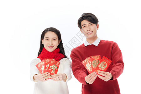 青年夫妻春节拜年发红包高清图片