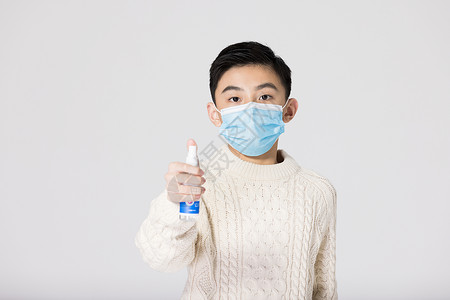 冠状病毒传播青少年儿童戴口罩手部清洁消毒背景
