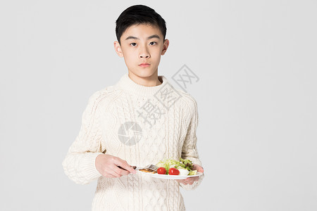 青少年男生健康绿色饮食背景图片