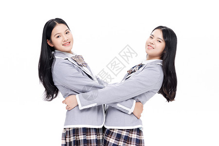 穿校服的青少年闺蜜拥抱高清图片