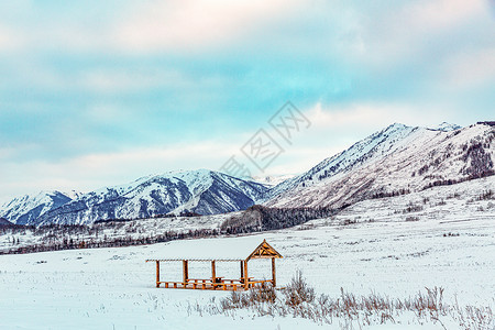 雪山降雪新疆禾木村冬季雪景美景背景