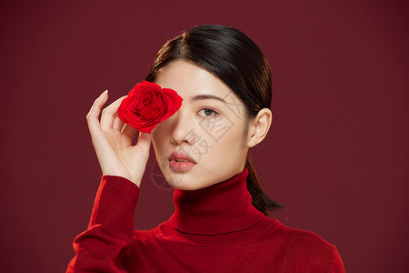 新年春节中国风美女拿玫瑰花高清图片