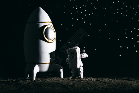 火箭太空月球太空登月创意微距背景