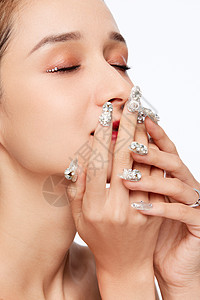 女性美妆美容钻石美甲背景