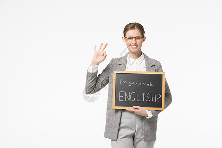 欧洲教育英语外教单手托着小黑板做ok手势背景